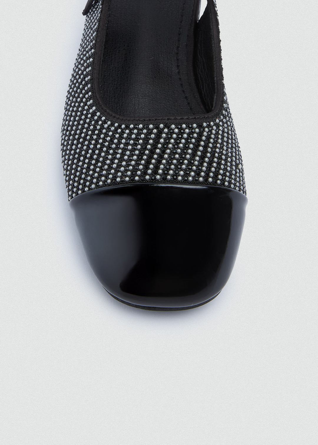 Two-Tone Cap-Toe Slingback Flats - Black